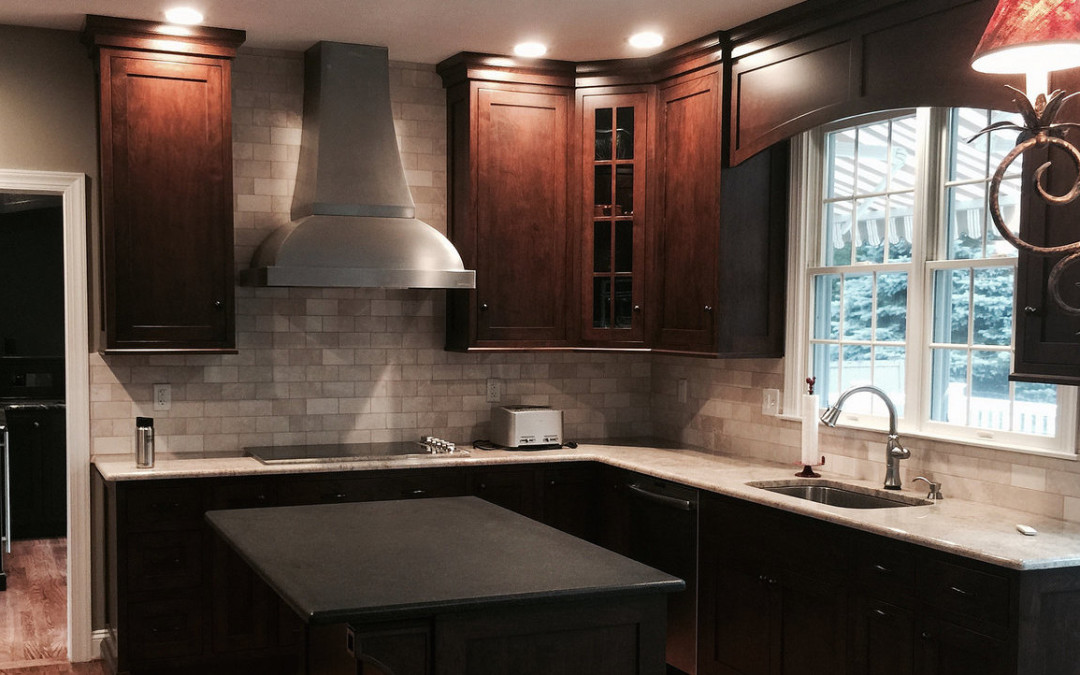 What is the first step in a kitchen remodeling project?
